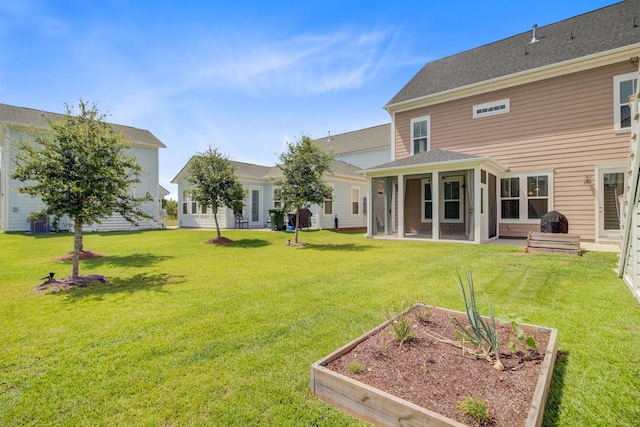 357 Parish Farms Dr, Summerville, SC 29486 - view of grassy yard featuring a garden and a sunroom