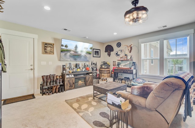 357 Parish Farms Dr, Summerville, SC 29486 - living area with carpet flooring, recessed lighting, and a glass covered fireplace