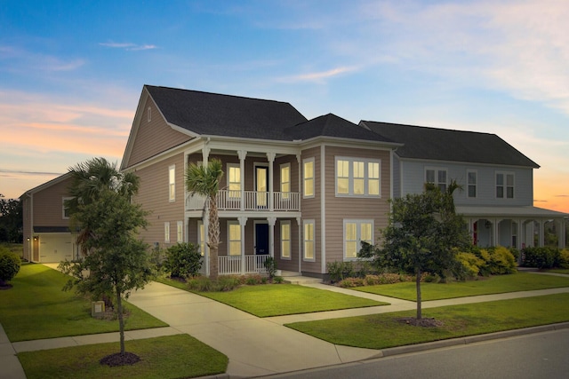 357 Parish Farms Dr, Summerville, SC 29486 - view of front of house with a porch, a balcony, and a front lawn