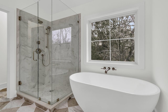 bathroom with independent shower and bath