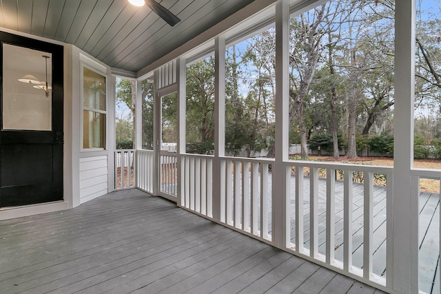 unfurnished sunroom featuring wooden ceiling