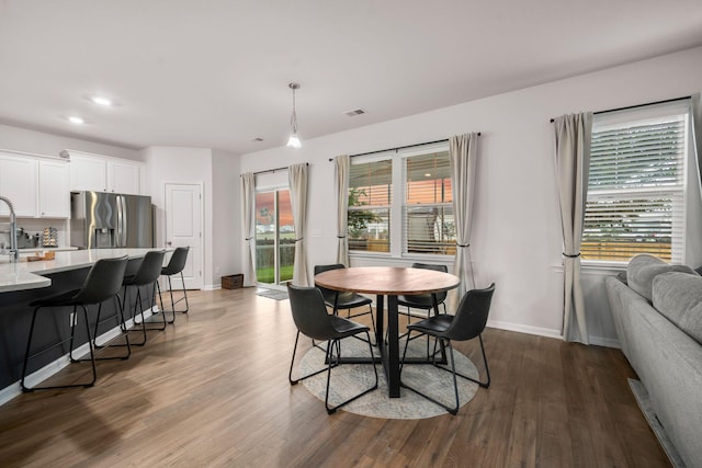 701 Squire Pope Rd, Summerville, SC 29486 - dining space featuring dark wood finished floors, plenty of natural light, and recessed lighting