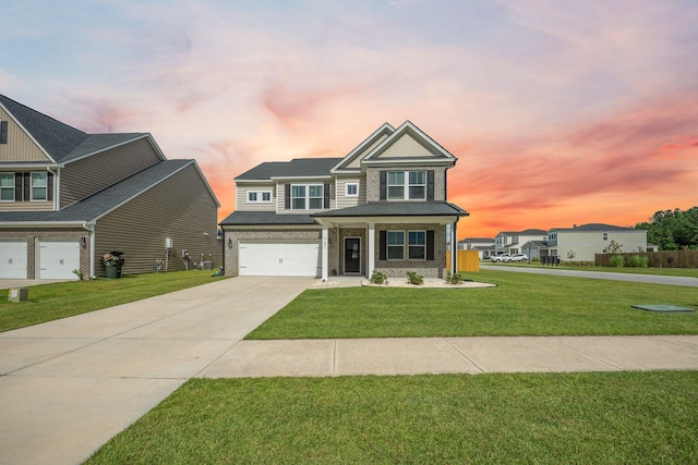 701 Squire Pope Rd, Summerville, SC 29486 - craftsman inspired home with concrete driveway, a lawn, a garage, and brick siding