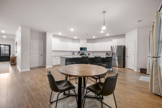 701 Squire Pope Rd, Summerville, SC 29486 - dining space featuring recessed lighting and light wood finished floors