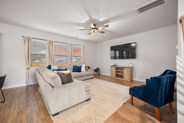 701 Squire Pope Rd, Summerville, SC 29486 - living area with ceiling fan and wood finished floors