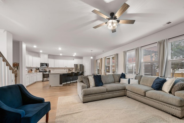 701 Squire Pope Rd, Summerville, SC 29486 - living room with light wood-style flooring, ceiling fan, and recessed lighting