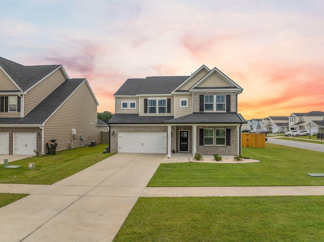 701 Squire Pope Rd, Summerville, SC 29486 - craftsman-style house with concrete driveway, a garage, brick siding, and board and batten siding