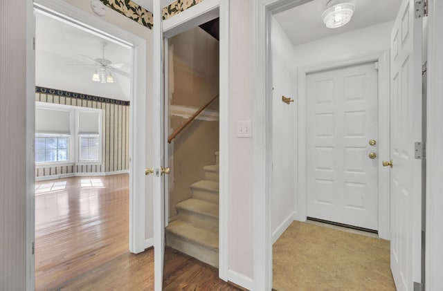 interior space featuring light wood-type flooring and ceiling fan