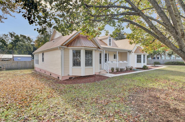 view of front of house featuring a porch and a front lawn