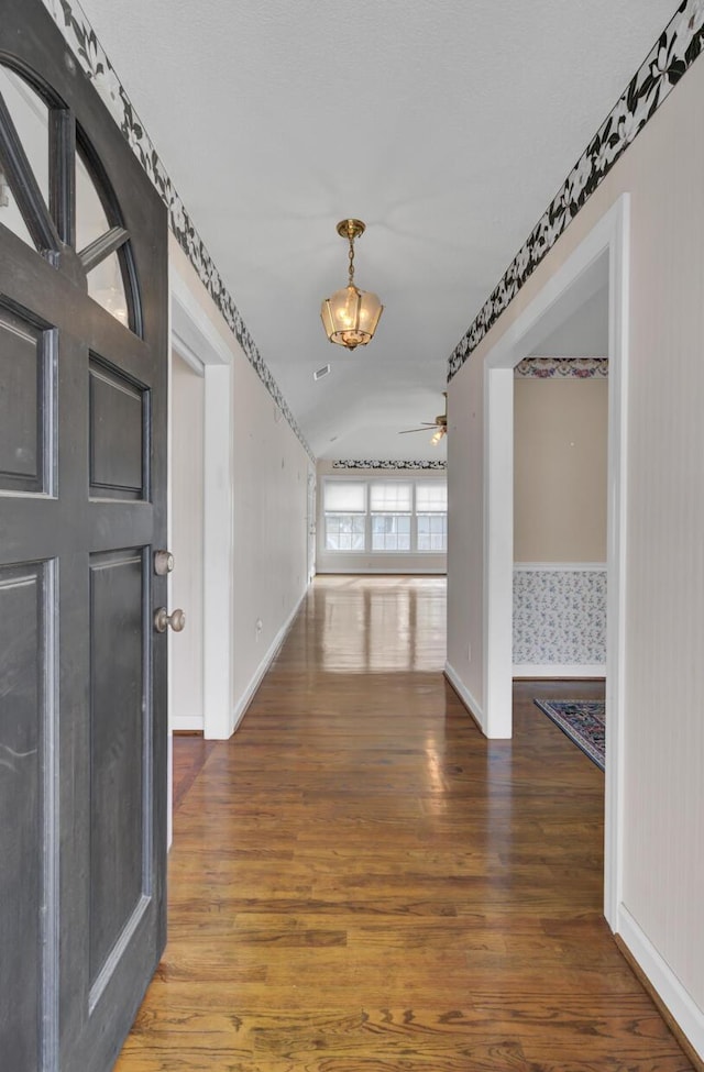 entrance foyer featuring hardwood / wood-style flooring and ceiling fan