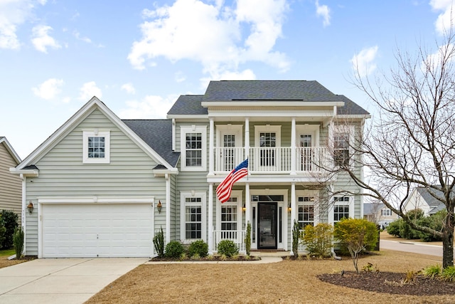 view of front of property featuring a porch and a garage