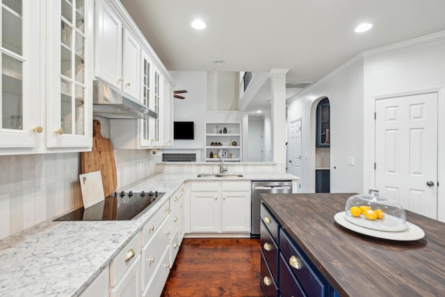 kitchen with butcher block countertops, blue cabinets, white cabinetry, dishwasher, and sink