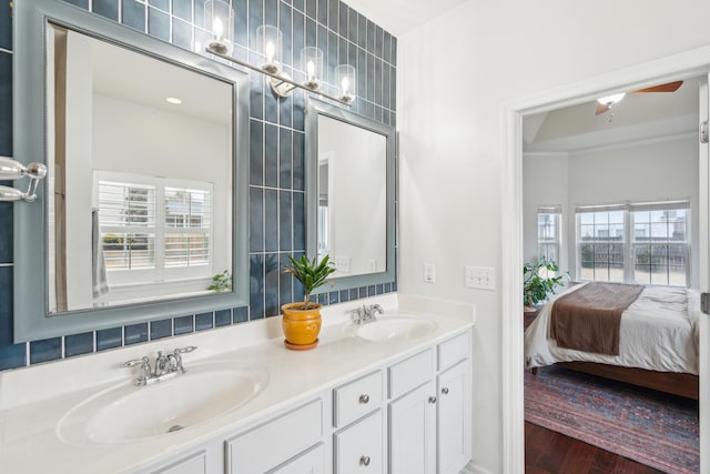 bathroom with vanity and hardwood / wood-style floors