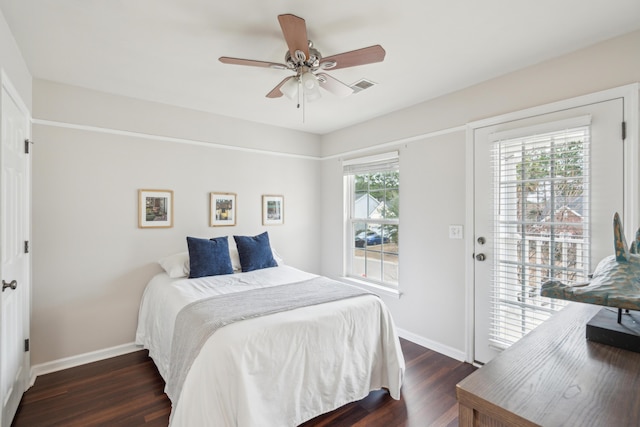 bedroom featuring dark hardwood / wood-style floors and ceiling fan