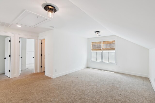 3806 Grateful Rd, North Charleston, SC 29420 - additional living space with light colored carpet, vaulted ceiling, and baseboards