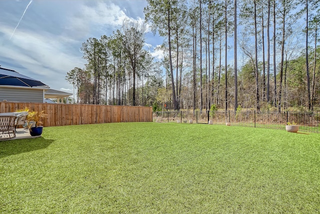 view of yard with fence