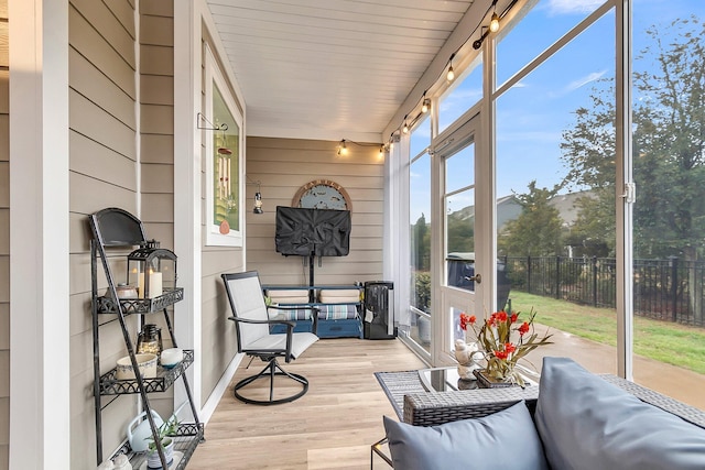 sunroom / solarium featuring plenty of natural light