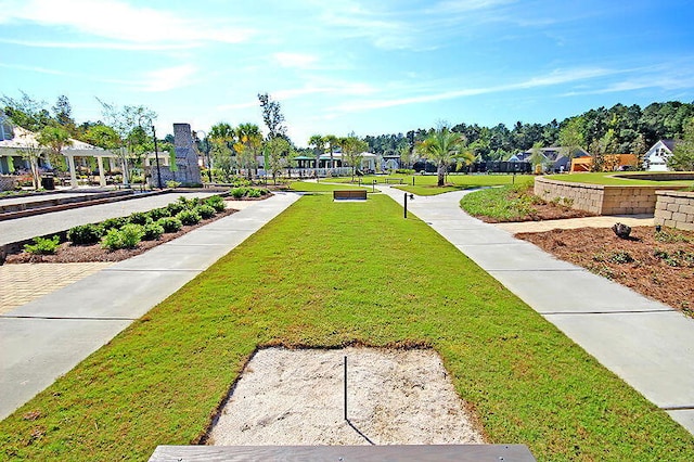 view of community with a lawn