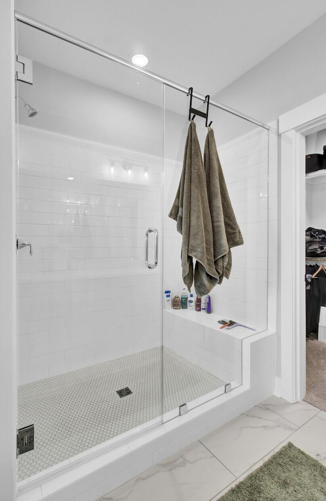 bathroom featuring walk in shower