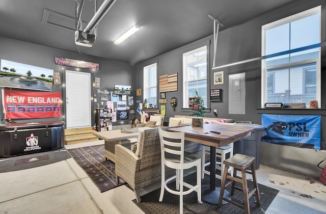 interior space featuring a garage door opener and electric panel