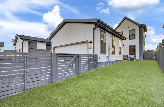 view of property exterior with a lawn