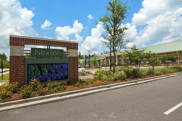 view of community sign