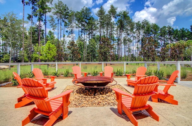 view of patio / terrace with an outdoor fire pit