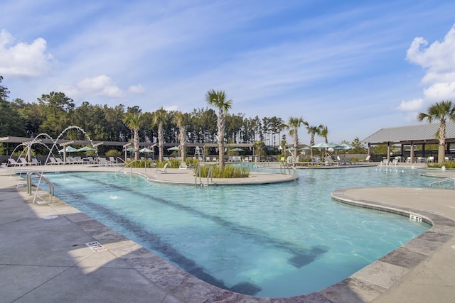 view of pool featuring a patio and pool water feature