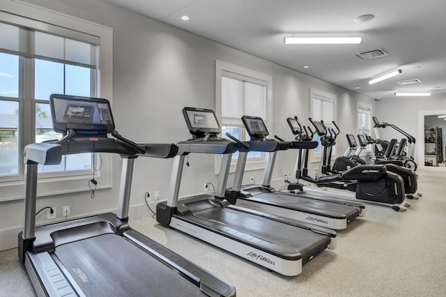 exercise room featuring a healthy amount of sunlight