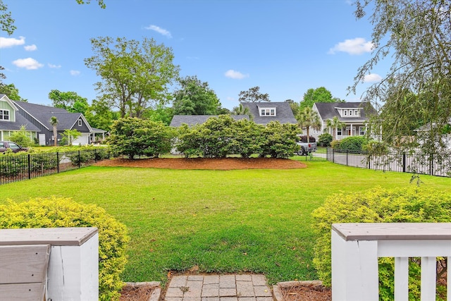view of yard featuring a residential view