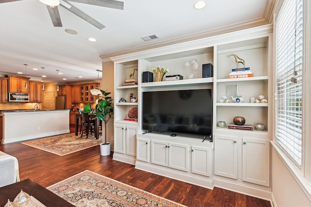 living area featuring dark wood-style floors, recessed lighting, ceiling fan, and crown molding