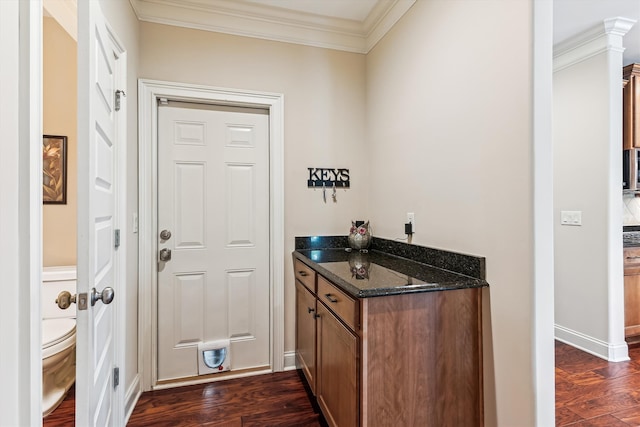 bar with crown molding, dark wood-style floors, and baseboards