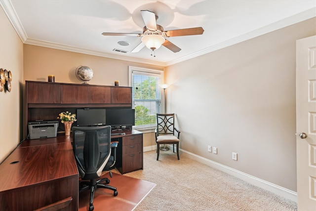 home office with a ceiling fan, ornamental molding, baseboards, and carpet flooring