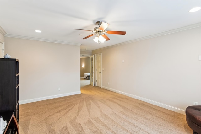 unfurnished bedroom featuring light carpet, baseboards, crown molding, recessed lighting, and ceiling fan