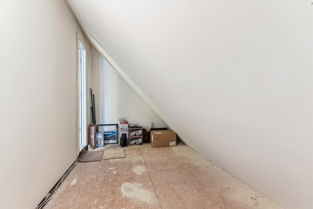 bonus room featuring vaulted ceiling