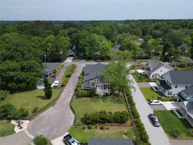 aerial view of residential area with a forest