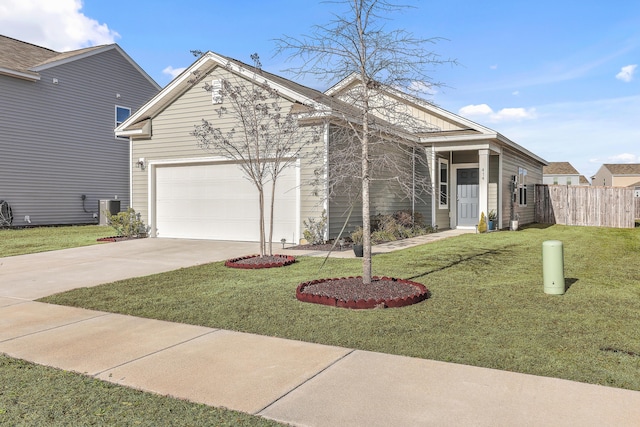 ranch-style house with central air condition unit, driveway, a garage, and a front yard