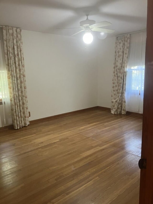 874 Evans Rd, Charleston, SC 29412 - empty room with wood finished floors and ceiling fan