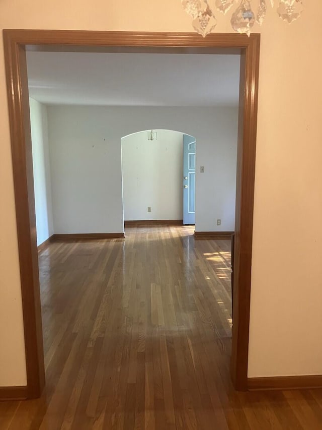 874 Evans Rd, Charleston, SC 29412 - hallway with arched walkways and dark wood-style flooring