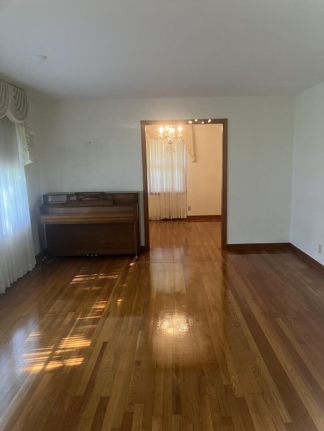 874 Evans Rd, Charleston, SC 29412 - spare room featuring a chandelier and wood finished floors