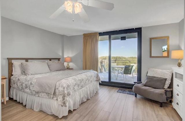 bedroom with floor to ceiling windows, ceiling fan, access to exterior, and light wood-type flooring