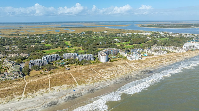 bird's eye view with a water view and a view of the beach