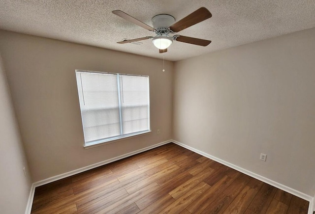 unfurnished room featuring a textured ceiling, hardwood / wood-style flooring, and ceiling fan