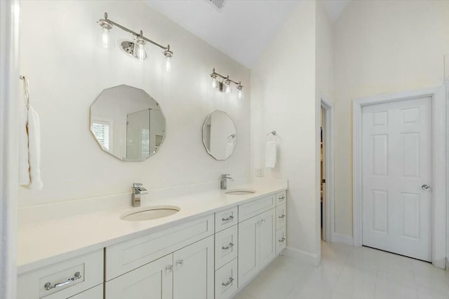 bathroom with vanity and tile patterned flooring