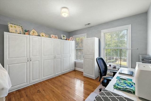 home office featuring light wood-type flooring