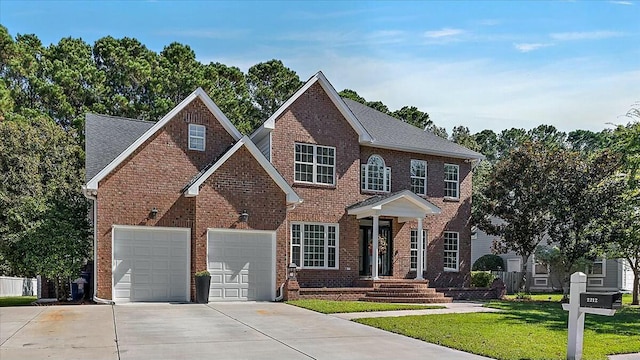 view of front facade with a front lawn and a garage