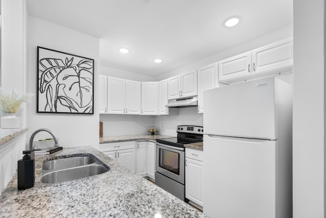 kitchen featuring white cabinetry, sink, light stone counters, white refrigerator, and stainless steel range with electric stovetop