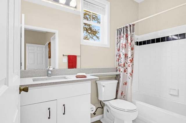 full bathroom featuring vanity, toilet, and shower / bath combo with shower curtain