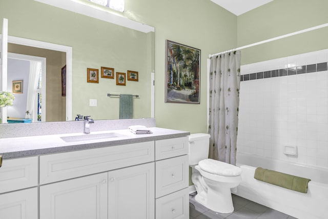 full bathroom with vanity, shower / bath combo, toilet, and tile patterned flooring