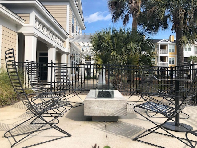 view of patio / terrace with an outdoor fire pit